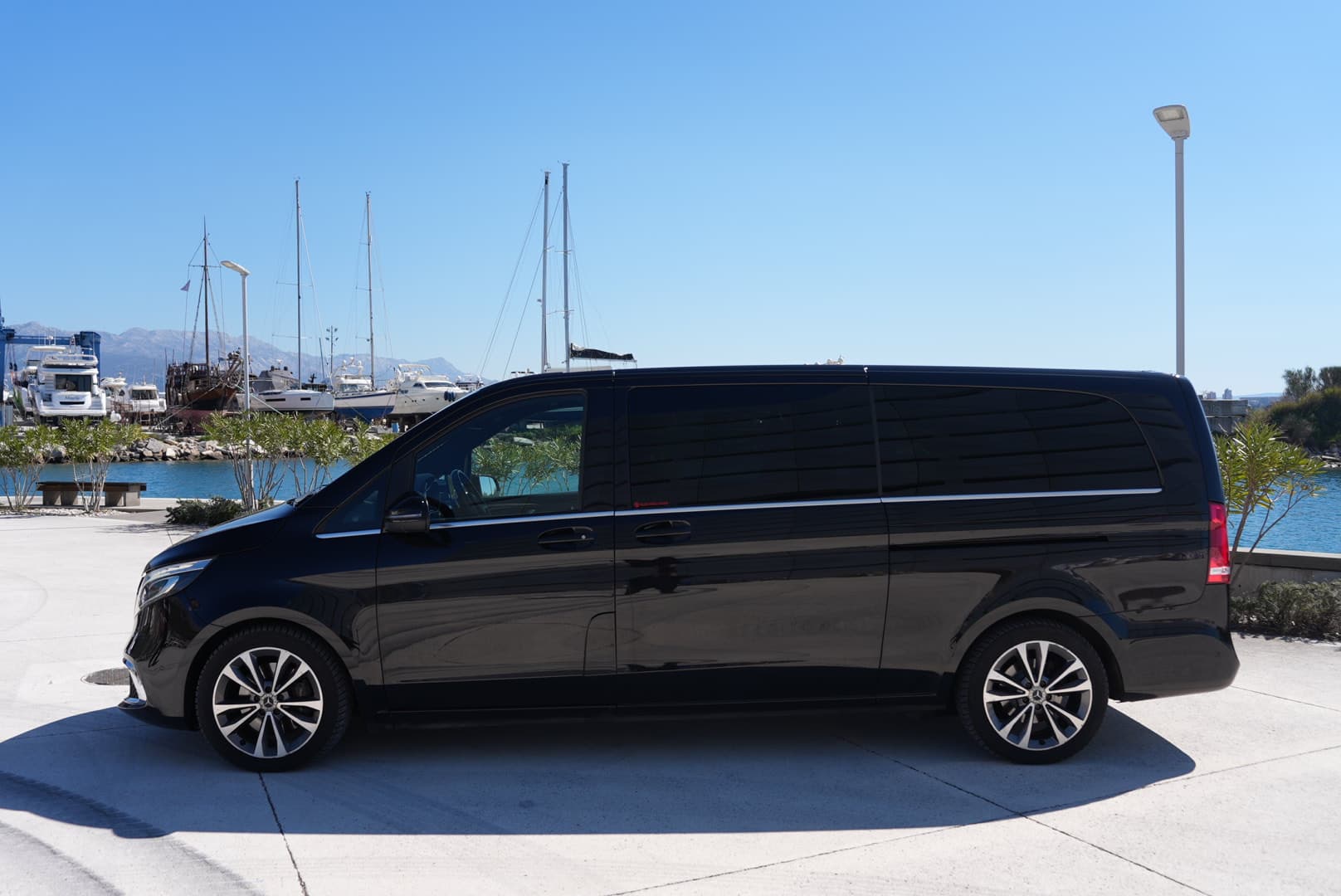 Mercedes-Benz V-Class side profile beside the water